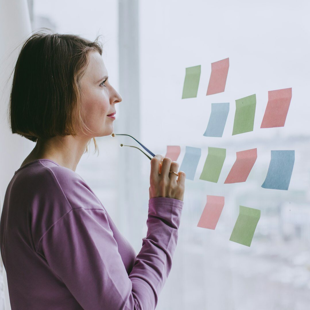 Professional female UX designer with creative casual style smiling